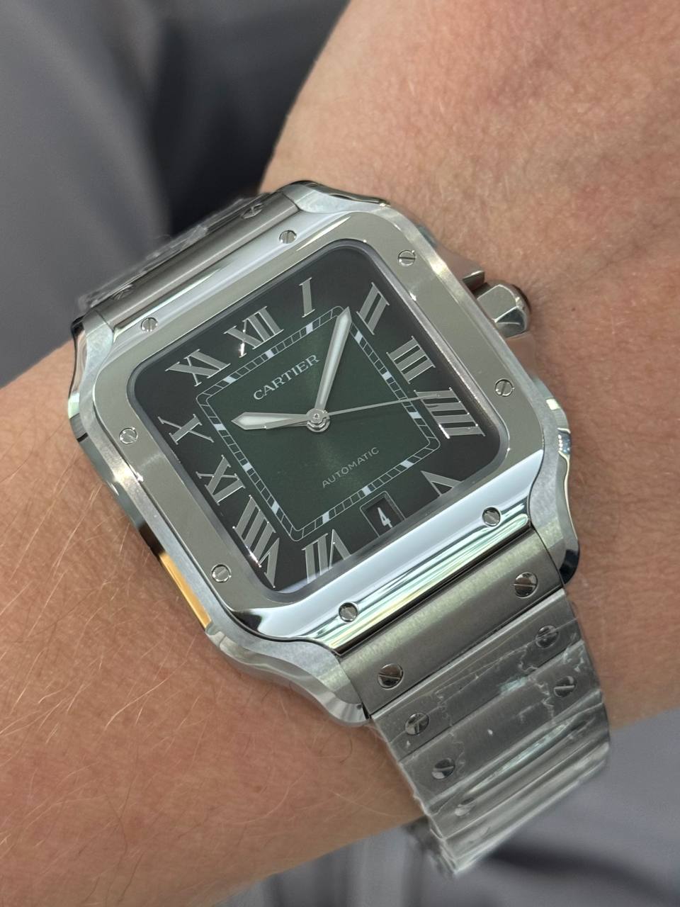 Cartier SANTOS — часы на запястье